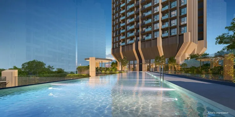 The Serra Residences 50-metre lap pool set above the arrival courtyard, with the tower behind