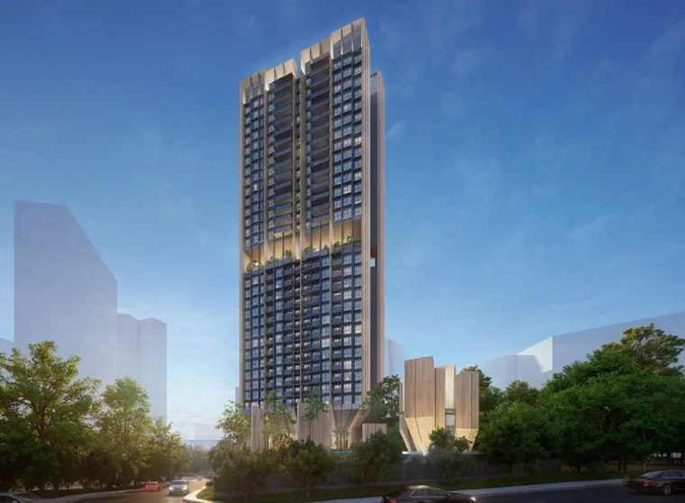 The Serra Residences tower rising above mature trees along Bassein Road, District 11